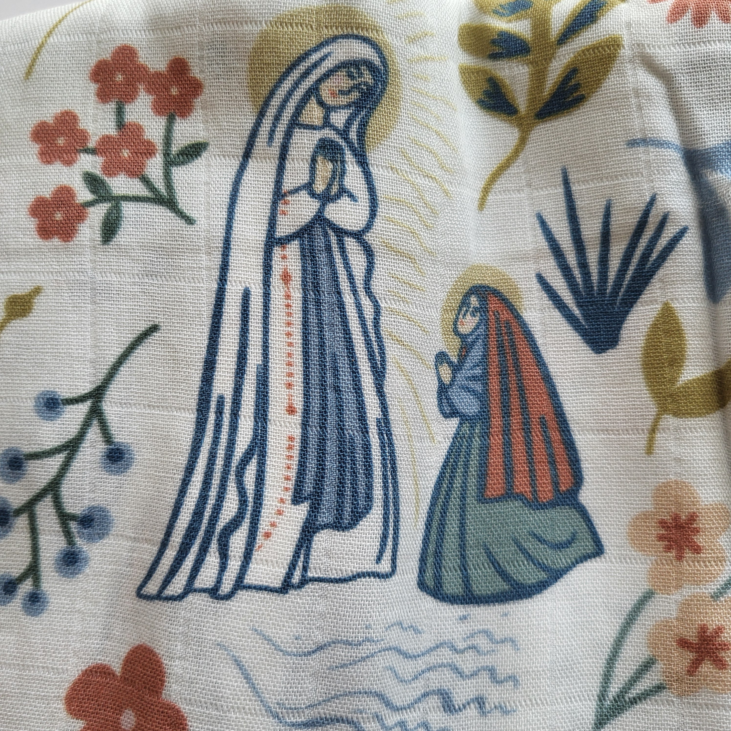 Our Lady of Lourdes Muslin Deluxe Swaddle | The Stump of Jesse