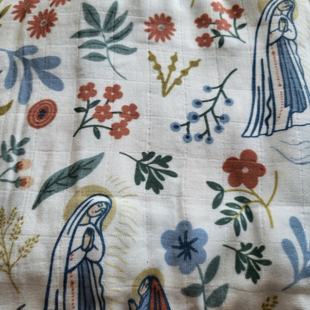 Our Lady of Lourdes Muslin Deluxe Swaddle | The Stump of Jesse